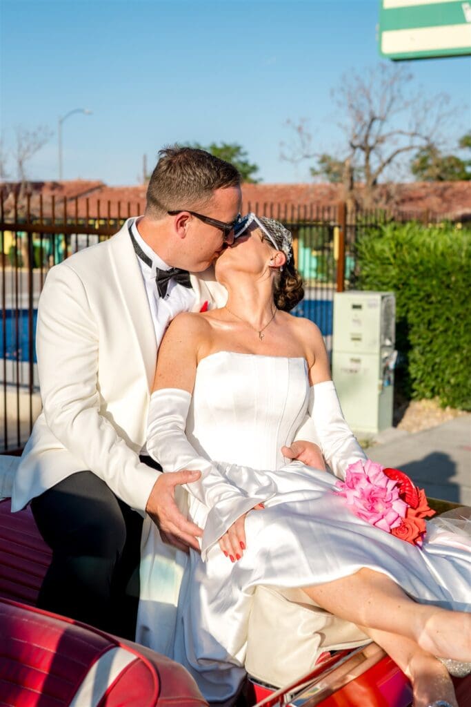 cute picture of the newlyweds kissing 