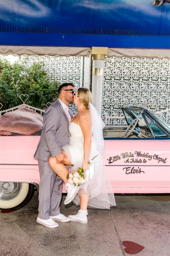 portrait of the newlyweds kissing 