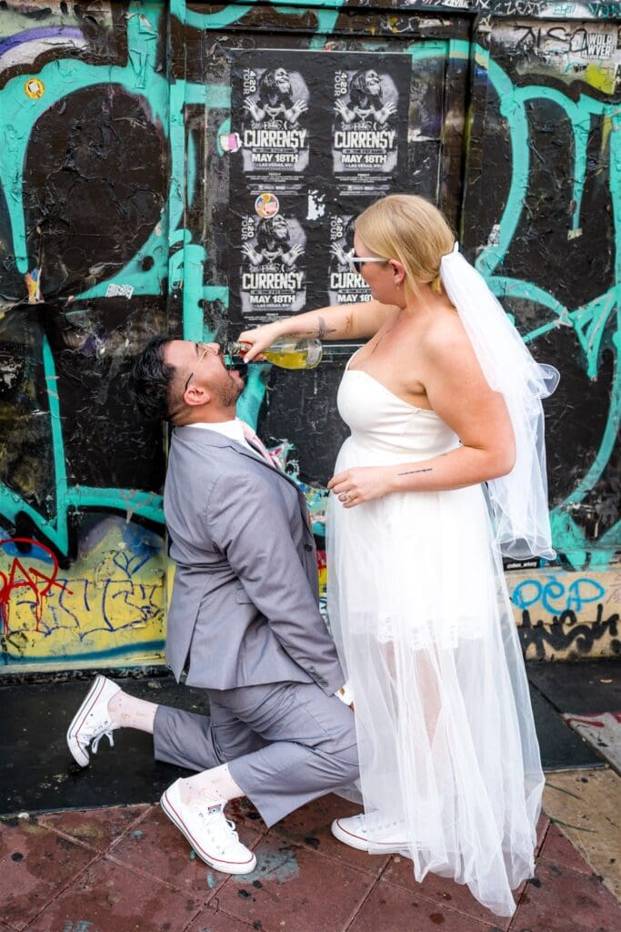 couple drinking champagne during their elopement 