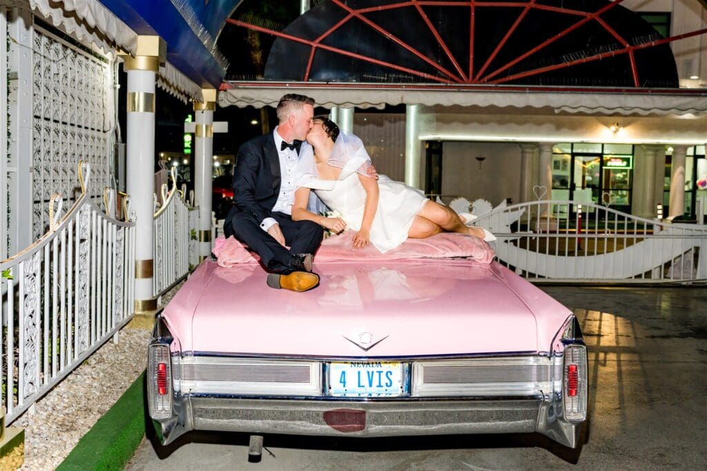 portrait of the newlyweds kissing before heading to DTLV