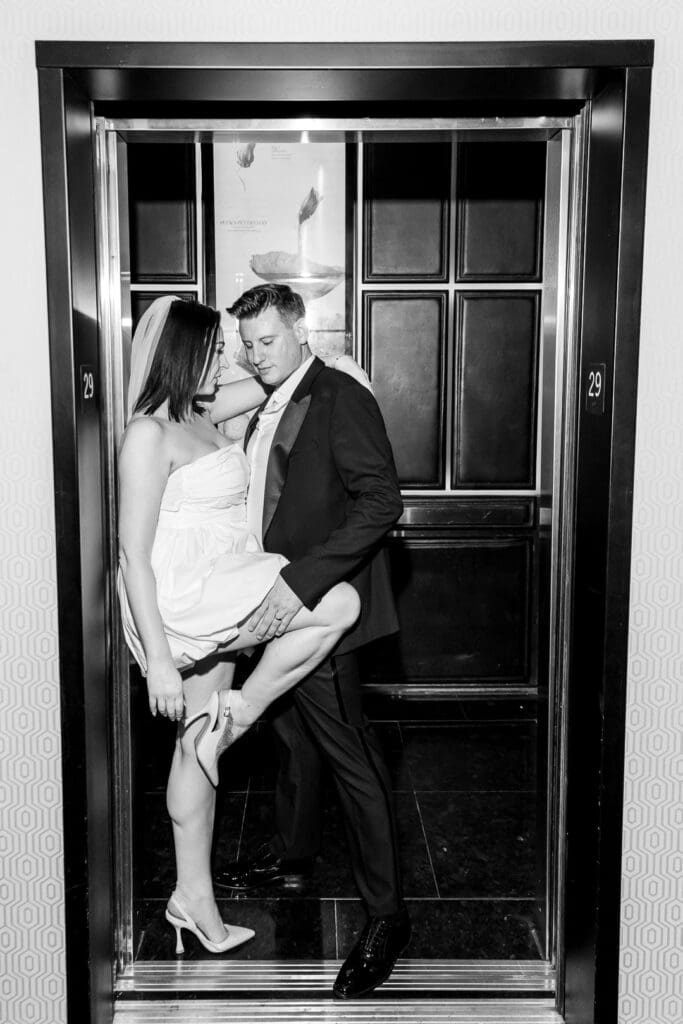Portrait of the newly married couple smiling at each other