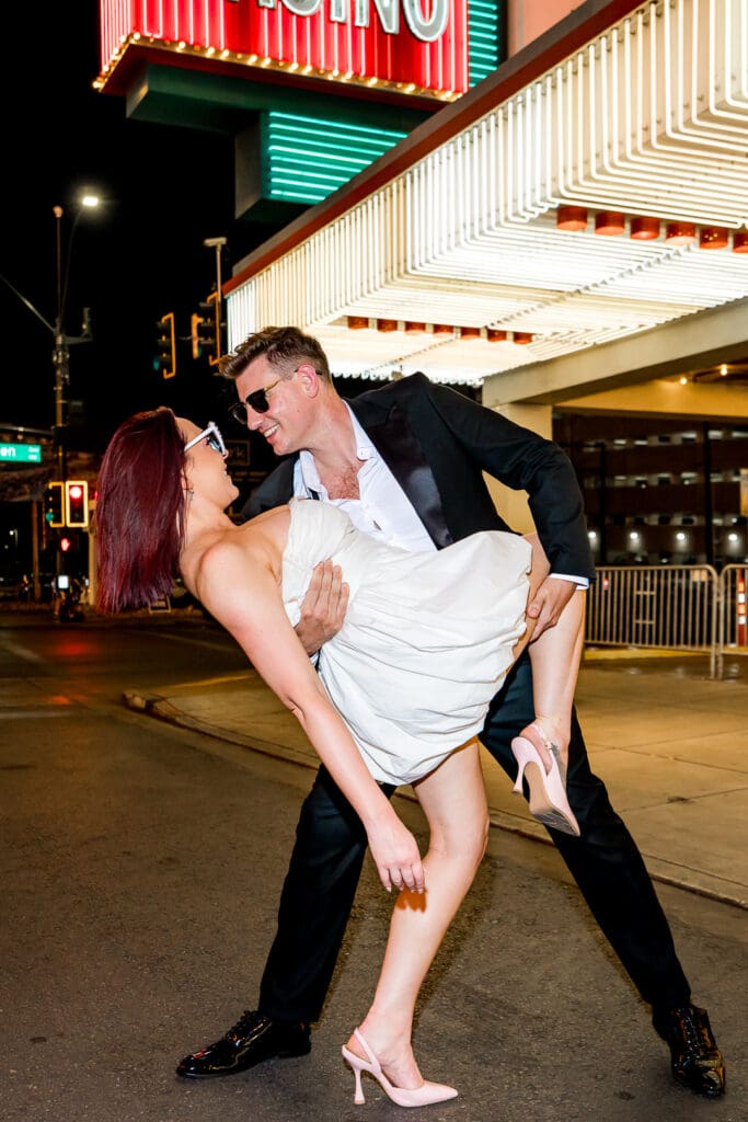 Picture of the newlyweds kissing in Fremont Street