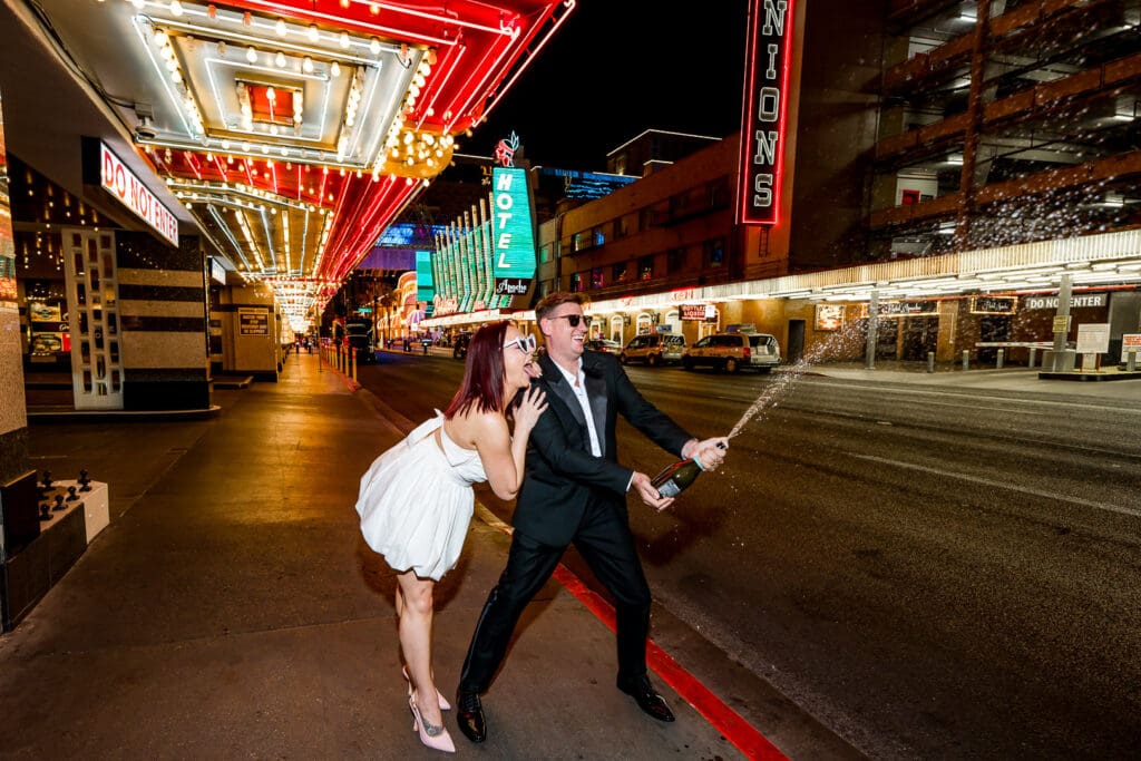 Couples celebrating their elopement with champagne