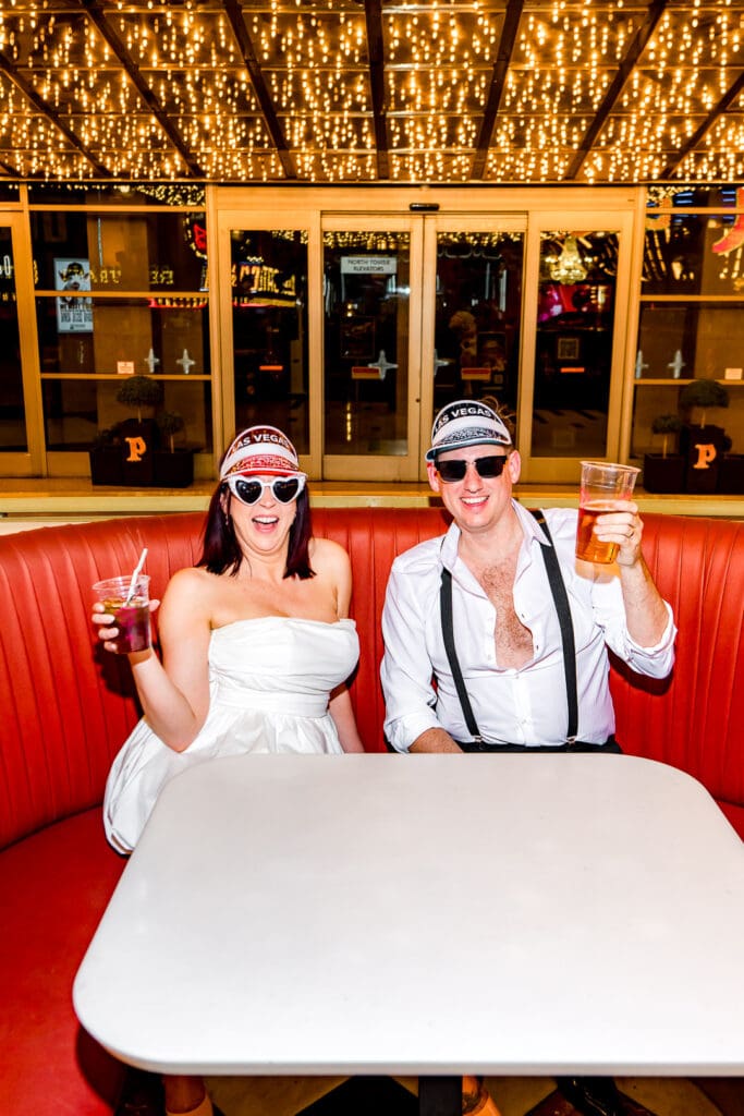 Couples celebrating their allotment with drinks