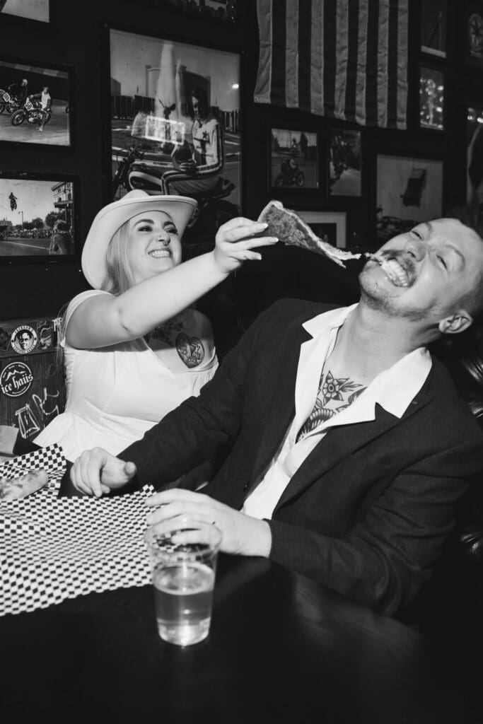 couple laughing with each other during their bridal session