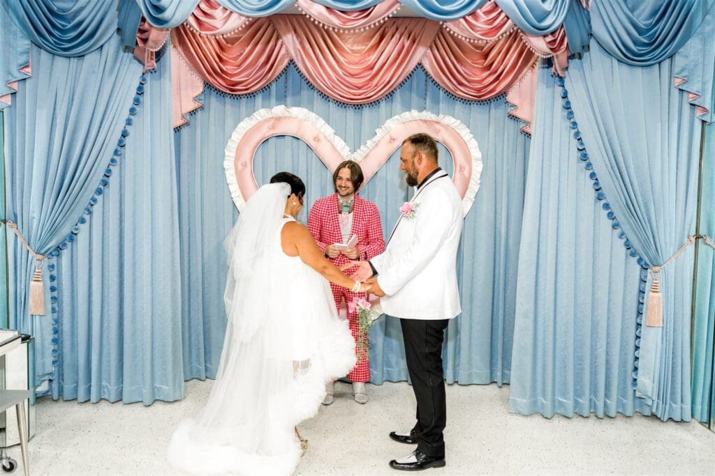 Iconic Fremont Street Elopement with Surething Vows & Tattoo Seals
