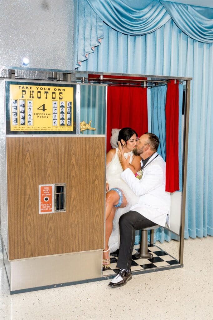 cute picture of the newlyweds kissing 
