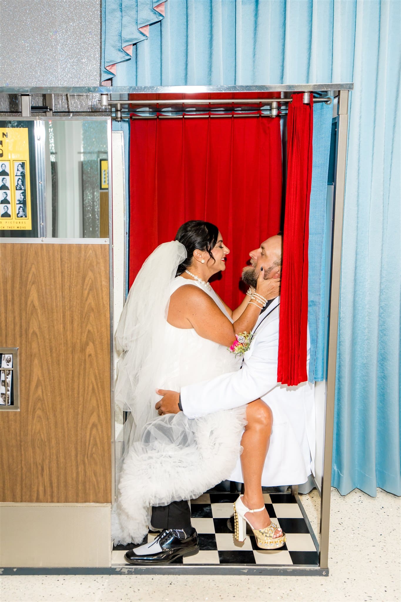 Picture of the newlyweds smiling at each other