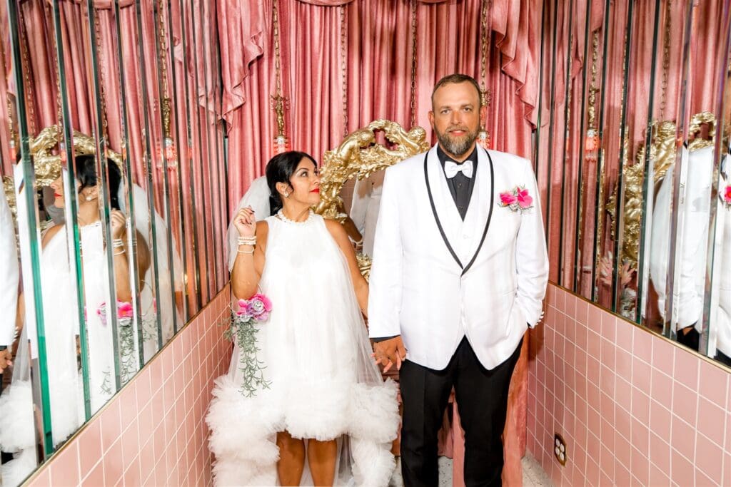 Newlyweds smiling at each other