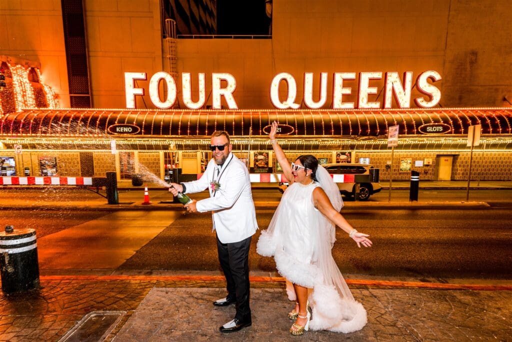 couple celebrating their elopement with champagne 