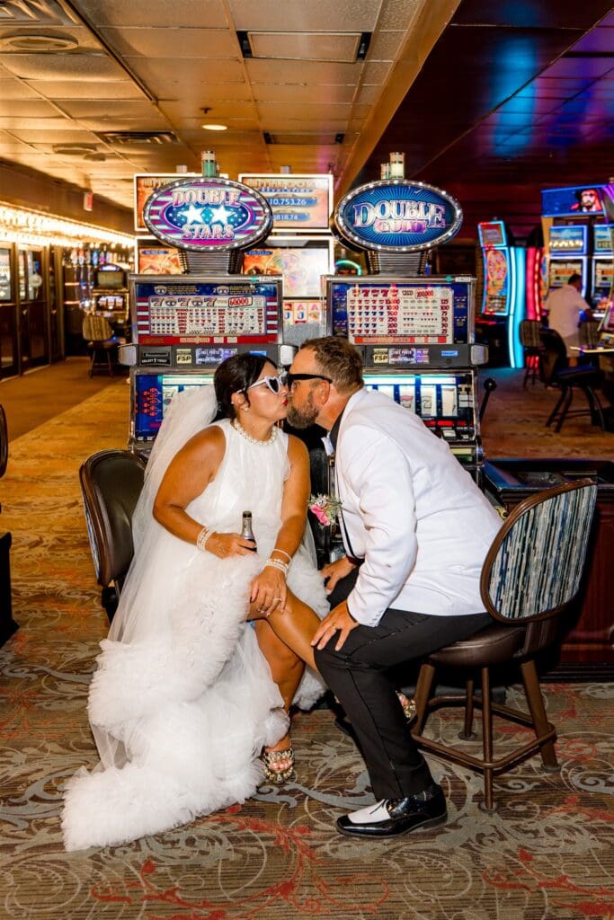 portrait of the newlyweds kissing
