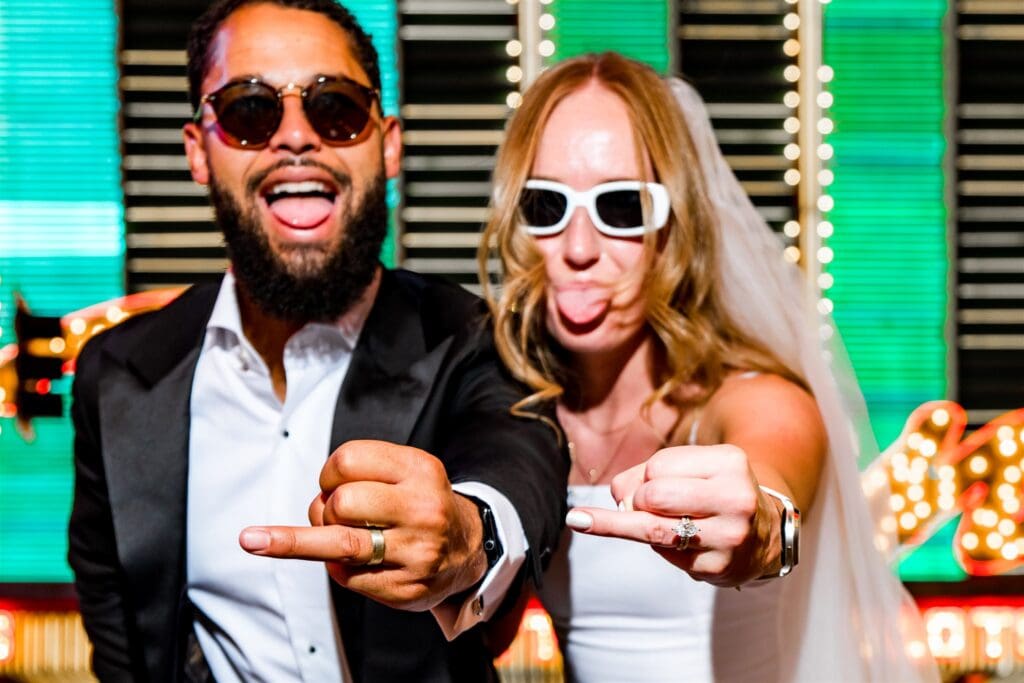 picture of the newlyweds showing their wedding rings