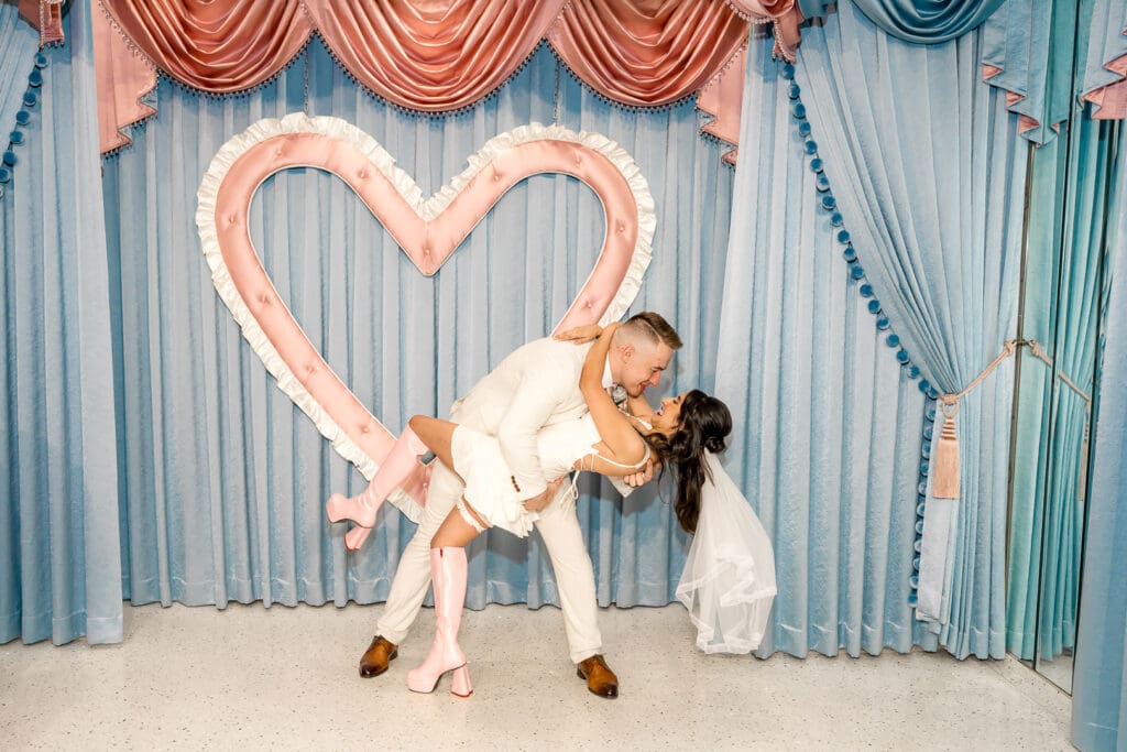 cute picture of the newlyweds kissing after their ceremony