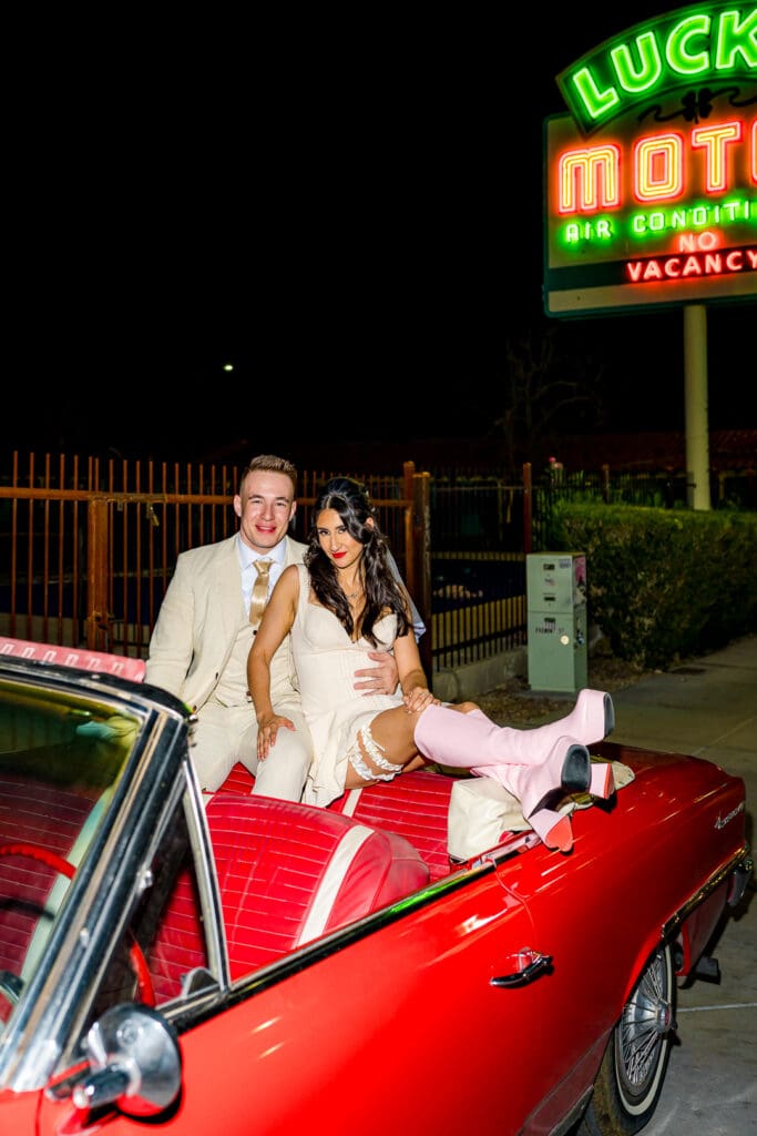 couple smiling at the camera during their photoshoot