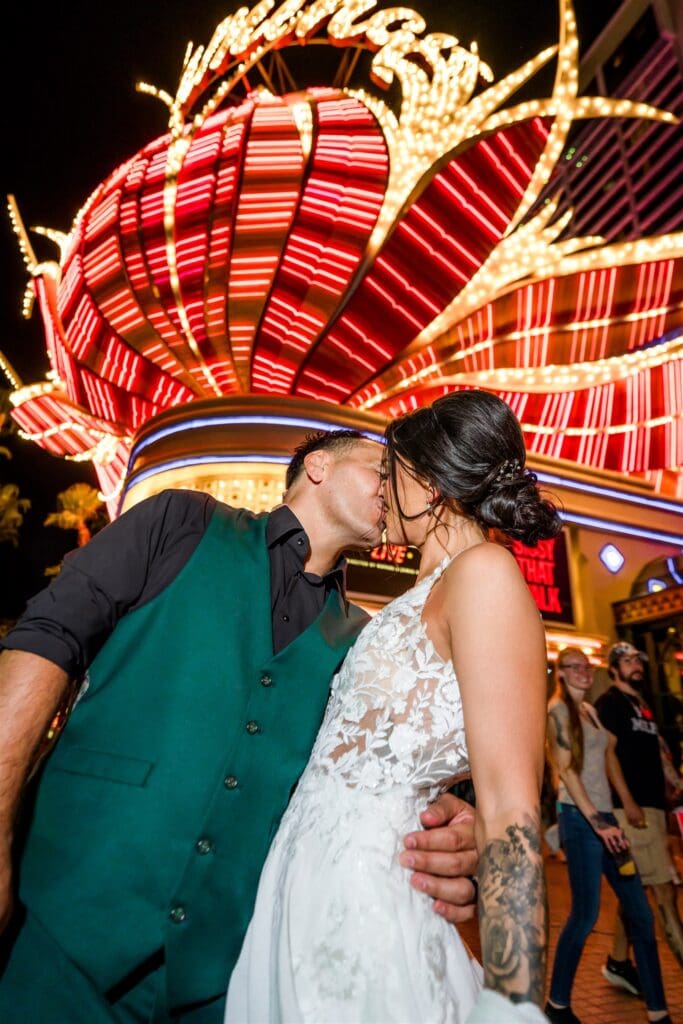 portrait of the newlyweds kissing