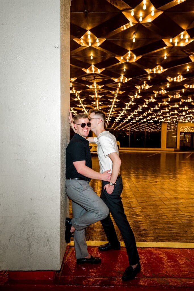 fiance kissing his fiance on the cheek