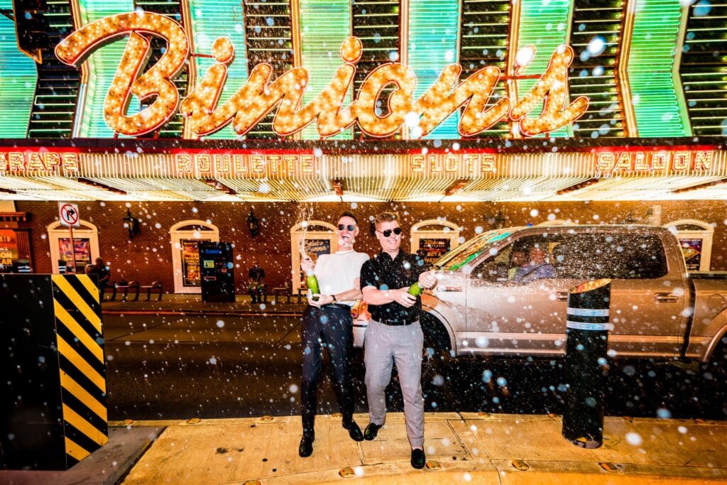 couple celebrating their elopement with champagne 