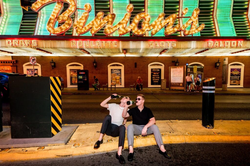 couple drinking champagne during their photoshoot