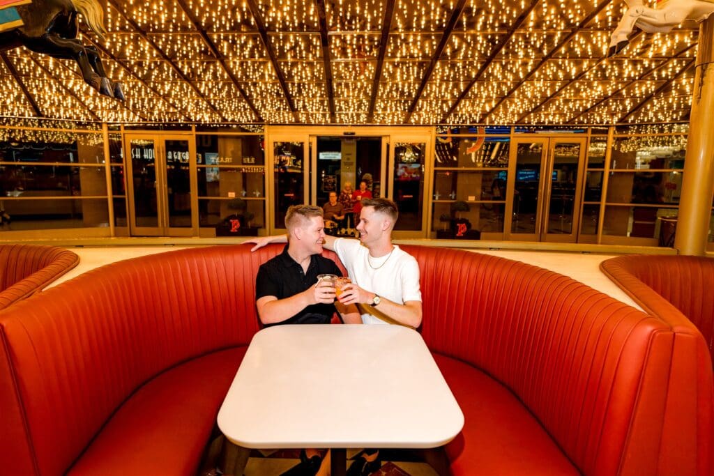 couple celebrating their elopement with drinks