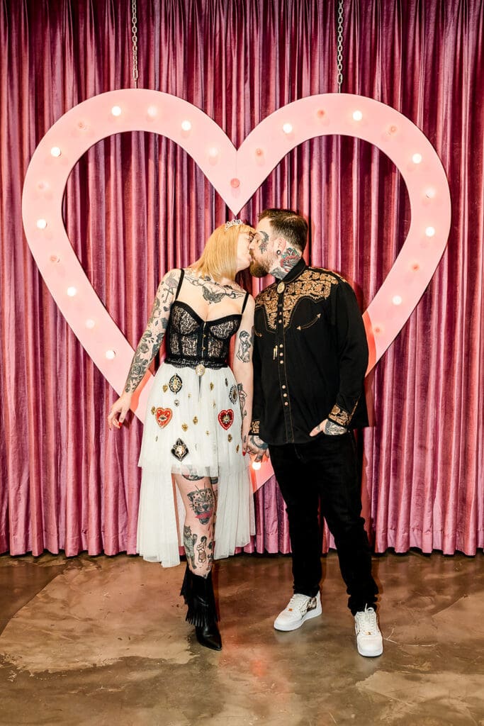 cute picture of the newlyweds kissing