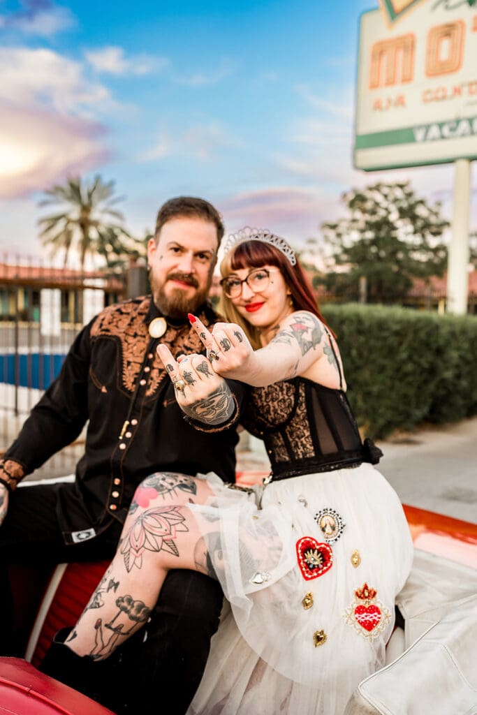 picture of the newlyweds showing their wedding rings