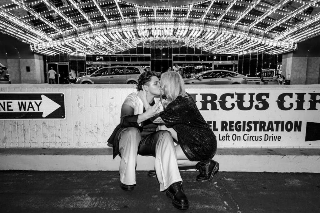 cute picture of the couple kissing during their photoshoot