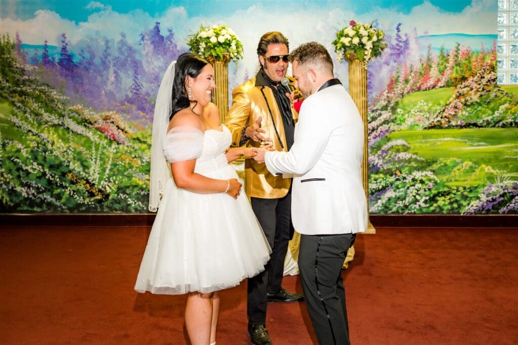 bride and groom holding hands during their ceremony