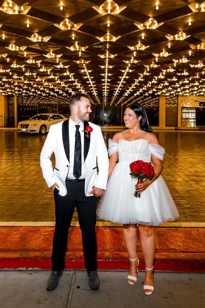 Cute picture of the newly married couple holding hands