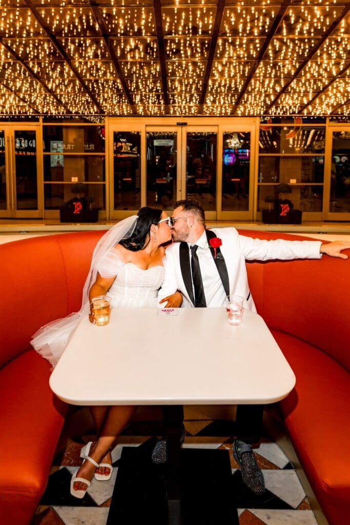 Couple celebrating there elopement with drinks