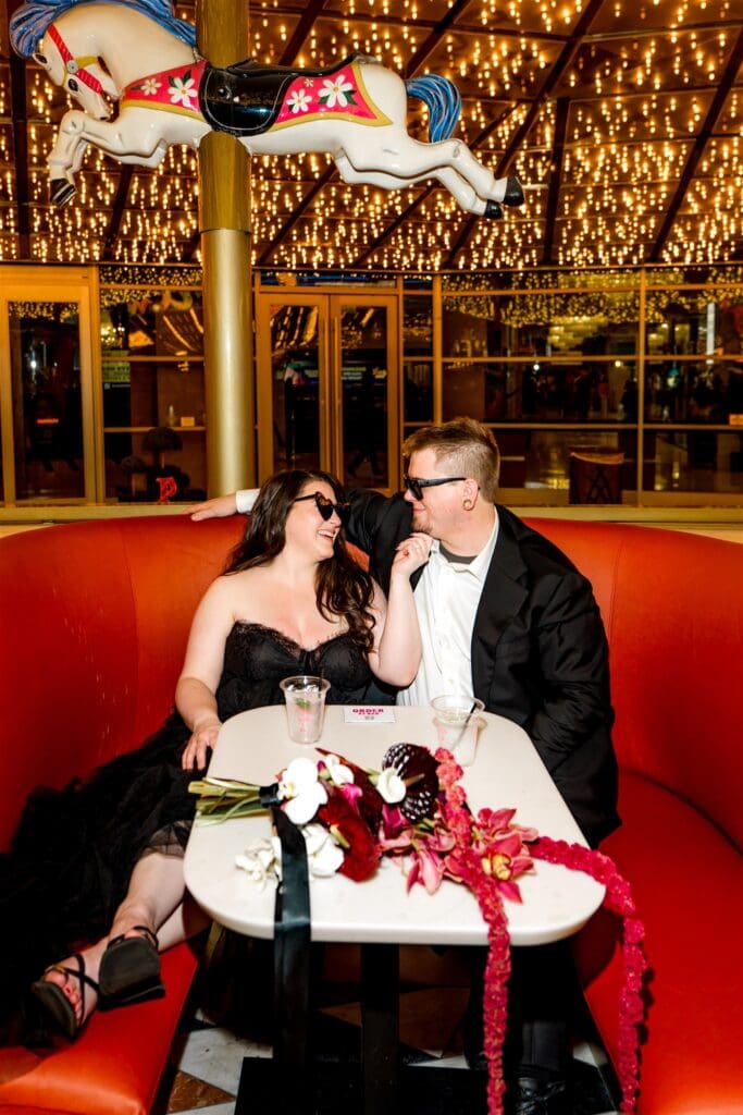 couple celebrating their elopement with champagne
