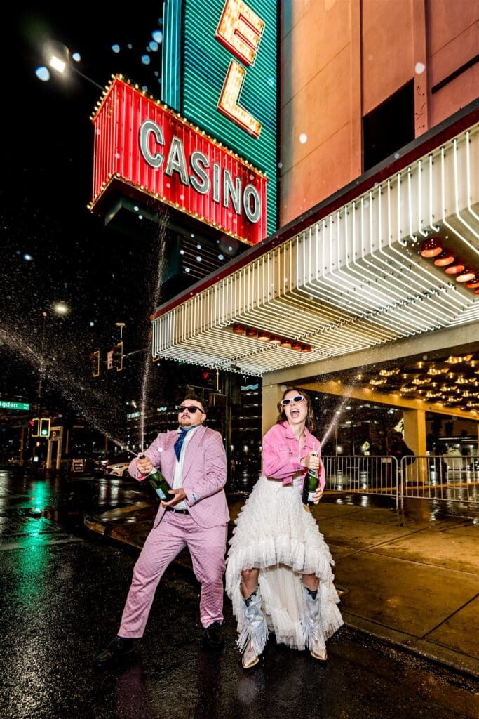 couple celebrating their elopement with champagne