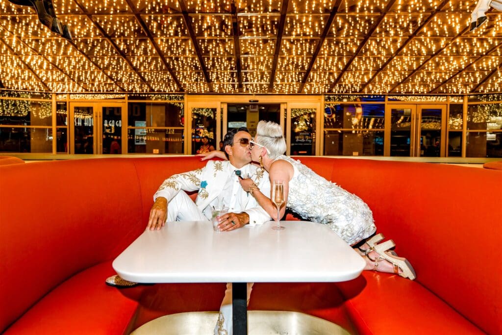 portrait of the newlyweds kissing