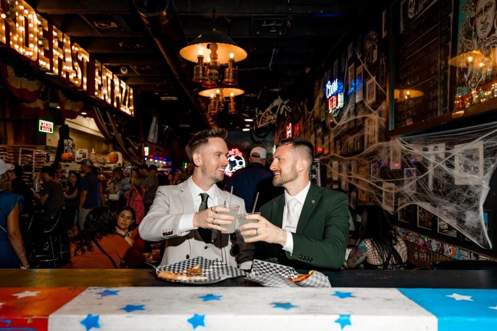 couple celebrating their elopement with pizza