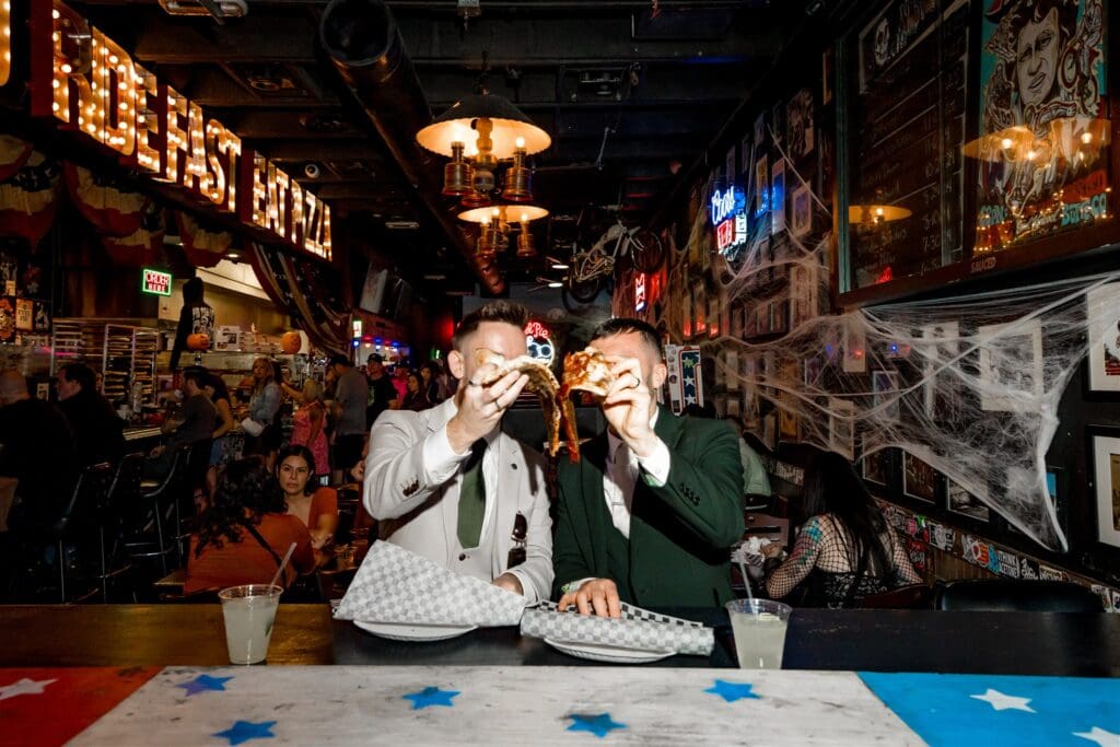 couple having pizza after their elopement ceremony
