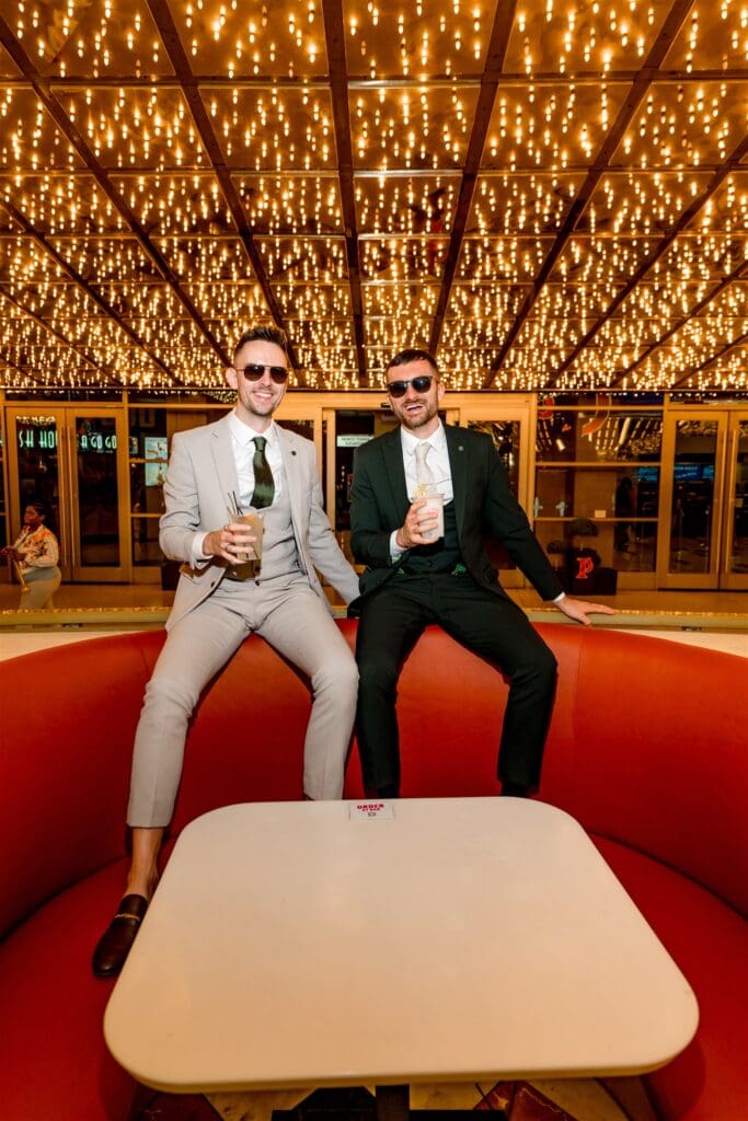 couple celebrating their elopement with drinks