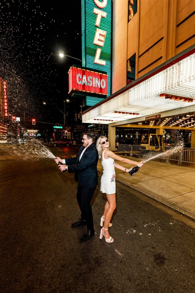 couple celebrating their elopement with champagne