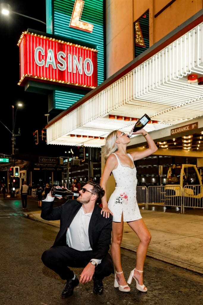 couple celebrating their elopement with champagne