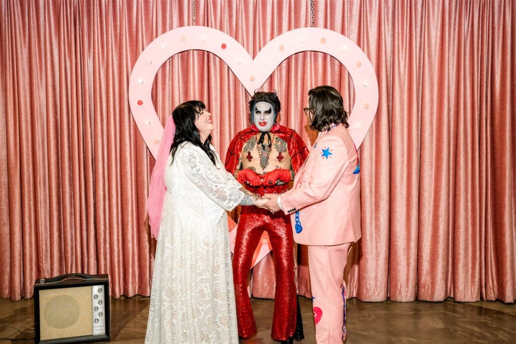cute picture of the bride and groom holding hands during their elopement ceremony