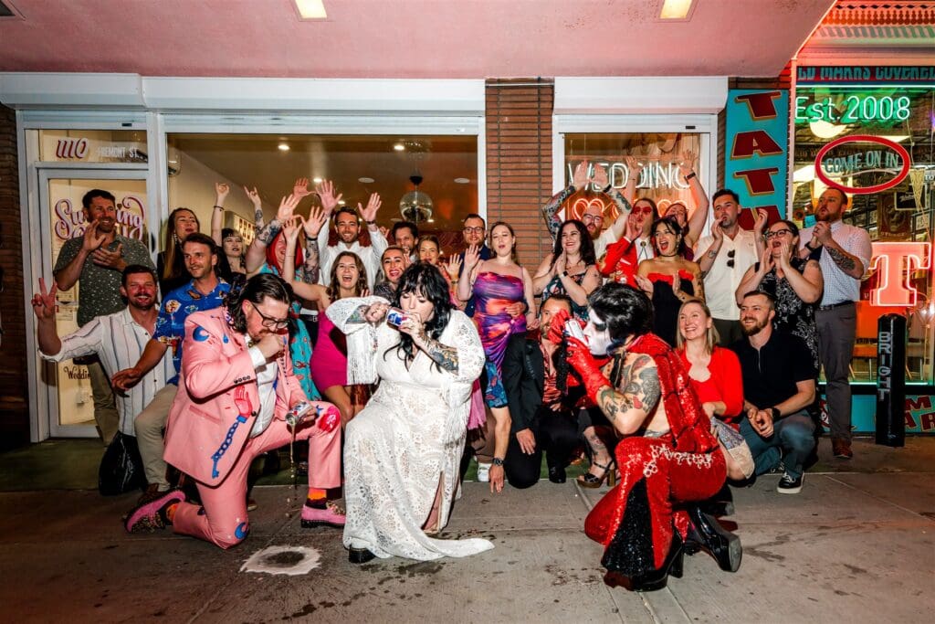 picture of the bride and groom with their wedding guests