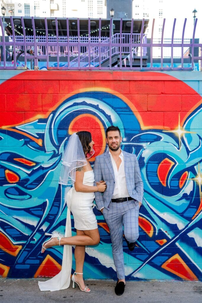 couple smiling at each other during their session