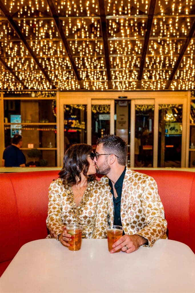 cute portrait of the newlyweds kissing at binion's