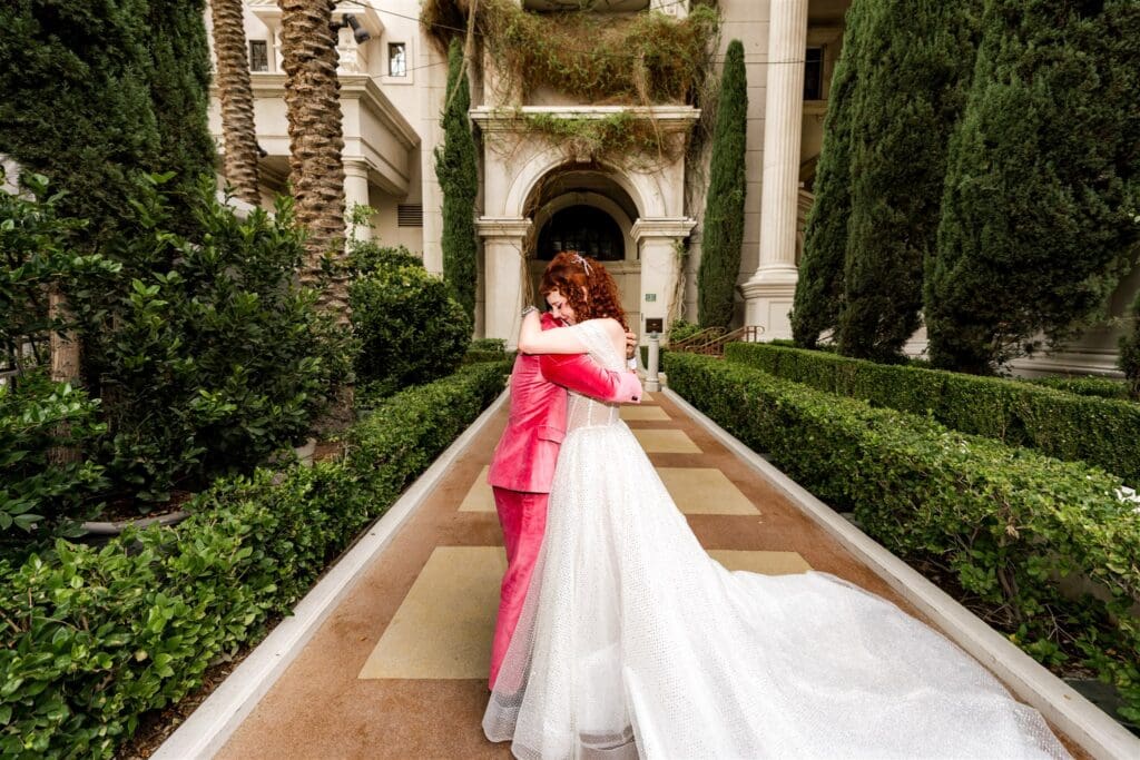 cute picture of the bride and groom hugging