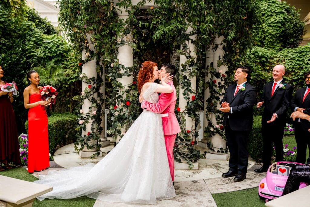 cute picture of the newly married couple kissing