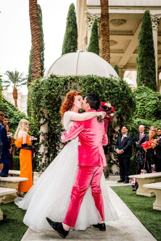 cute picture of the newlyweds kissing