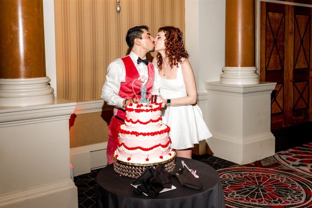 cute picture of the newlyweds trying their wedding cake