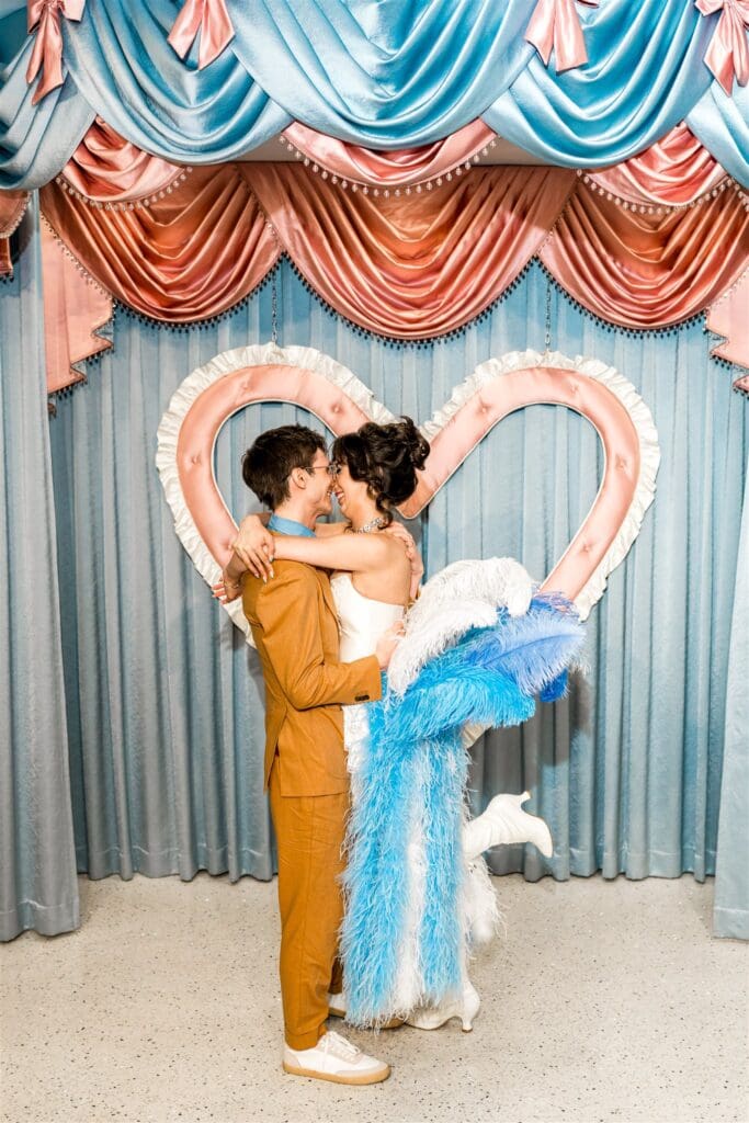 cute picture of the bride and groom kissing after their ceremony
