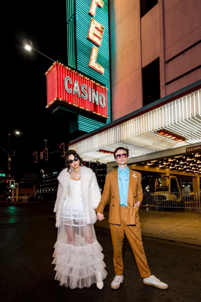 cute picture of the bride and groom holding hands