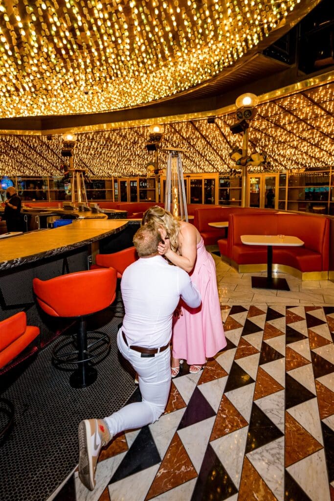 Two Strongman Badasses in Love: A Downtown Las Vegas Engagement Session at Carousel Bar