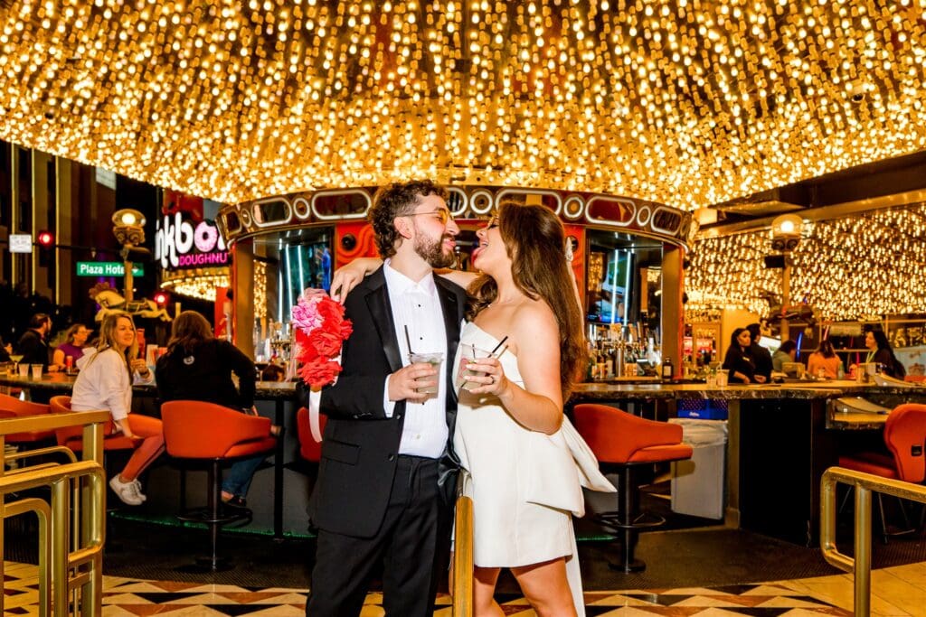 Playful bridal portraits at carousel bar