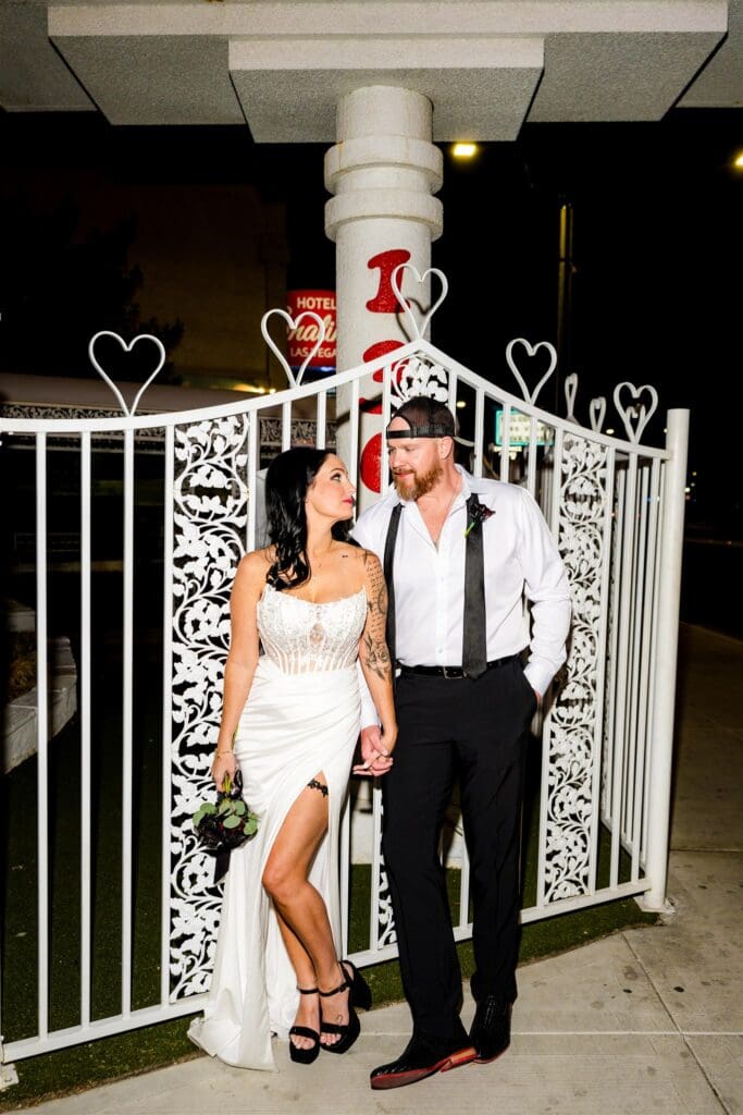cute picture of the newlyweds smiling at each other